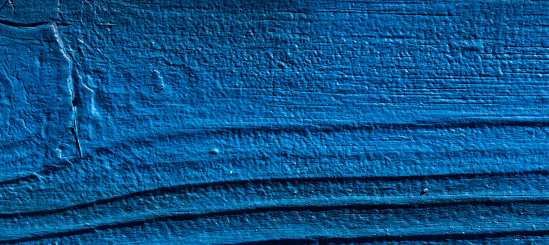 Plank of wood painted in blue texture Plank of wood painted in blue texture